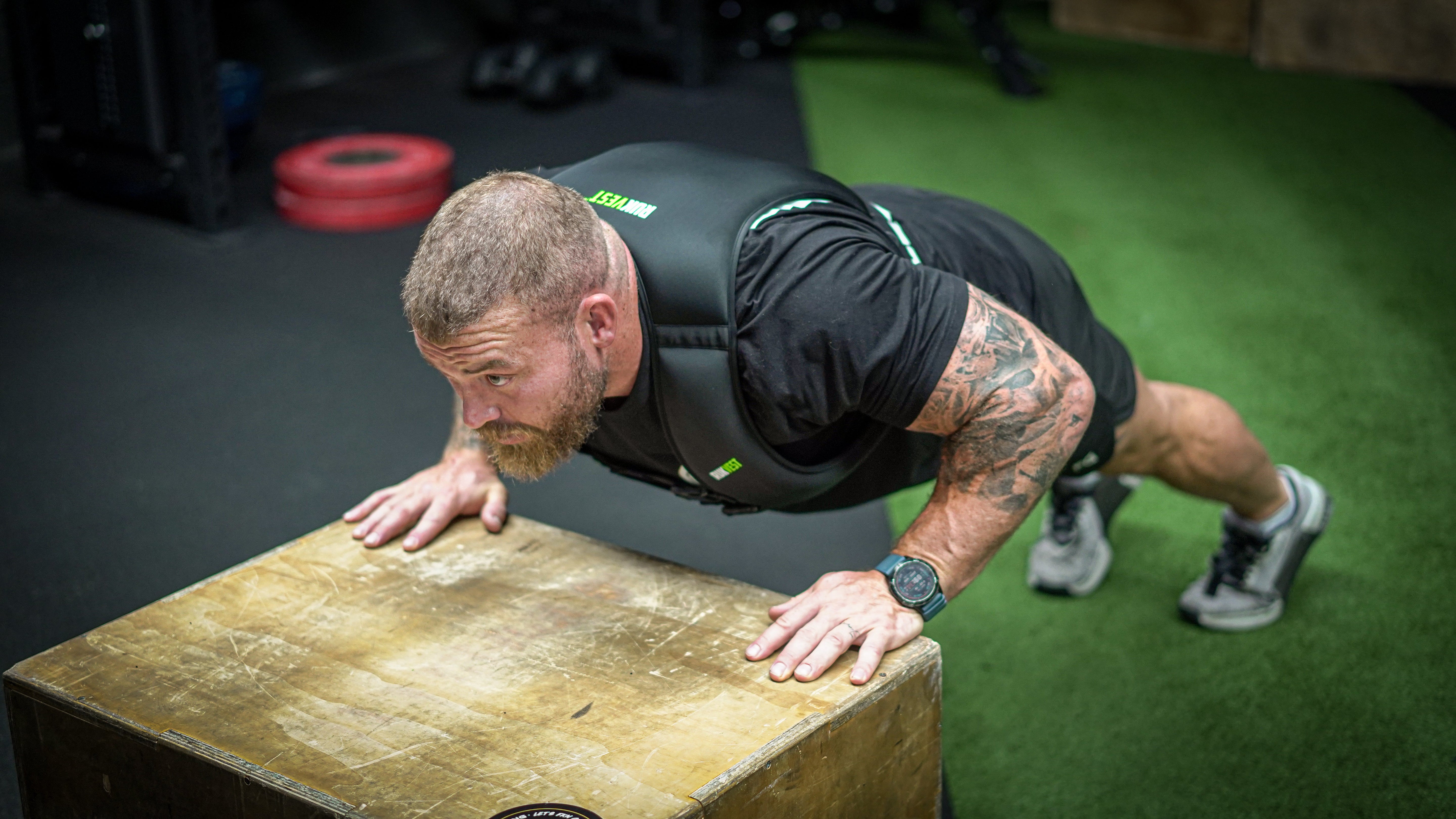 Man doing push ups with a RUKVEST