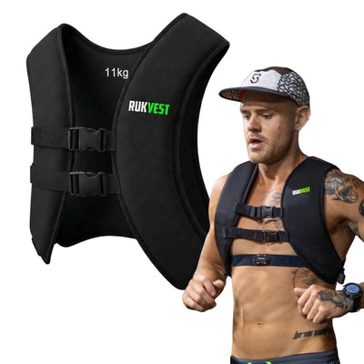 Black 11KG weight vest with 'Rukvest' branding worn by a man on a white background